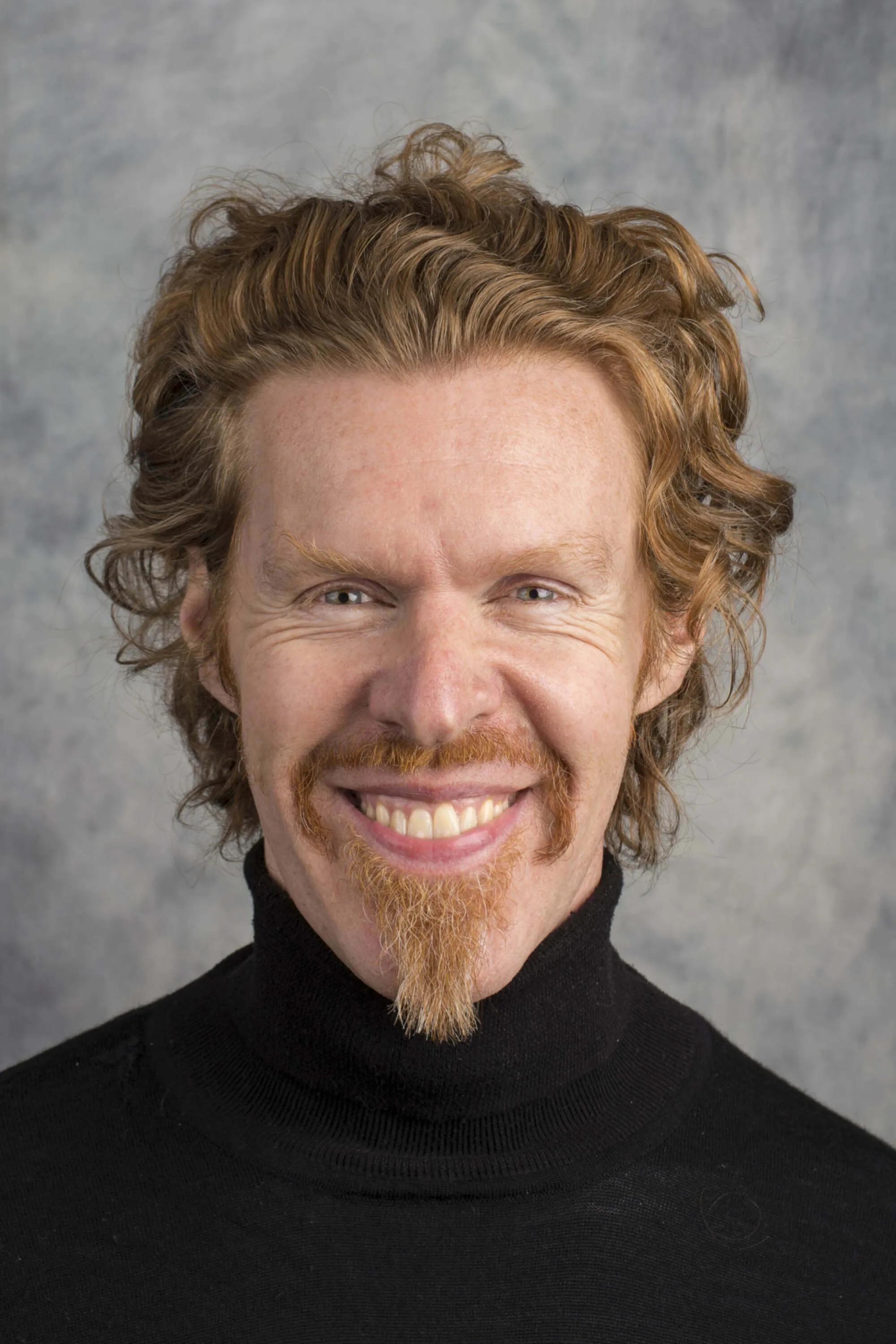 NEW Giles Abbott to replace main headshot in black top 1